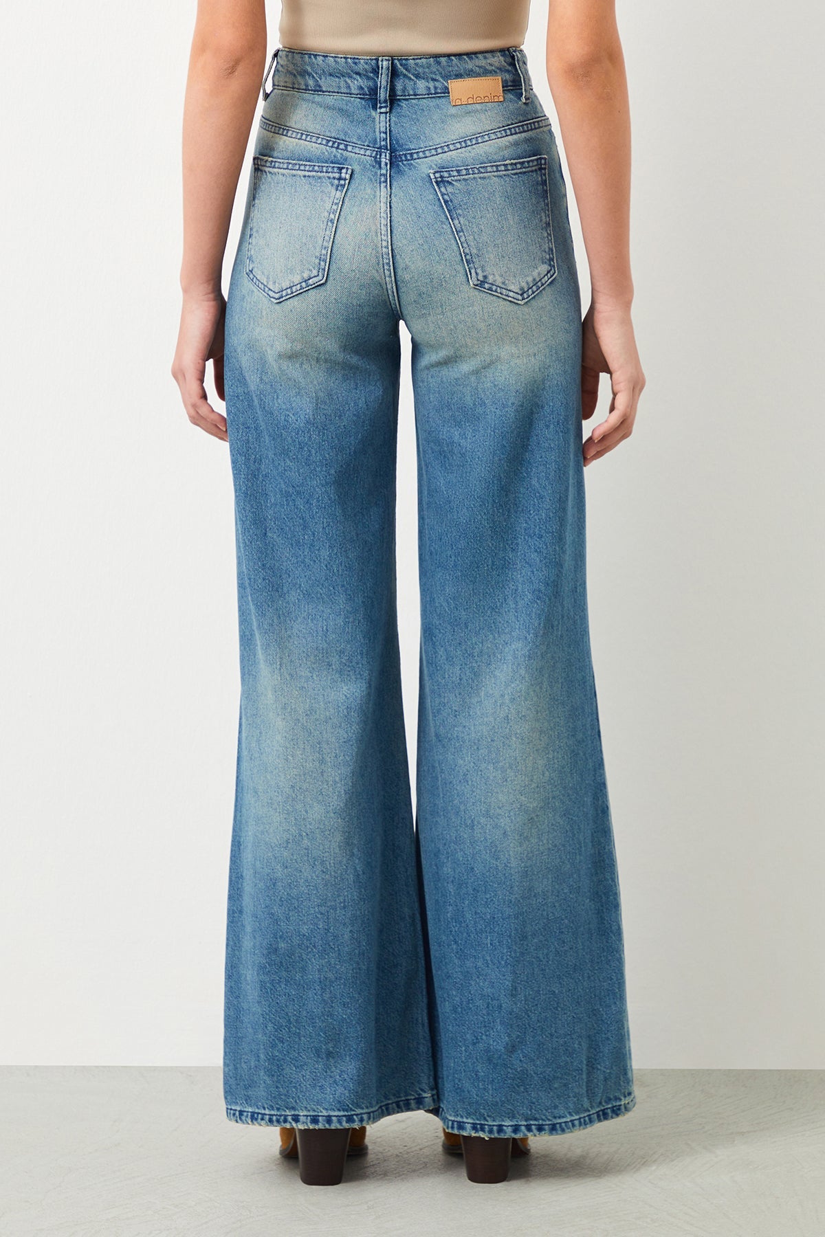 Back view of AWE Vintage jeans showcasing their relaxed and vintage feel