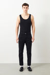  Great Summer Look : Man wears the Ra Denim-Vin Carrot Fit Black Organic Denim Men's Jeans with a black sleeveless top