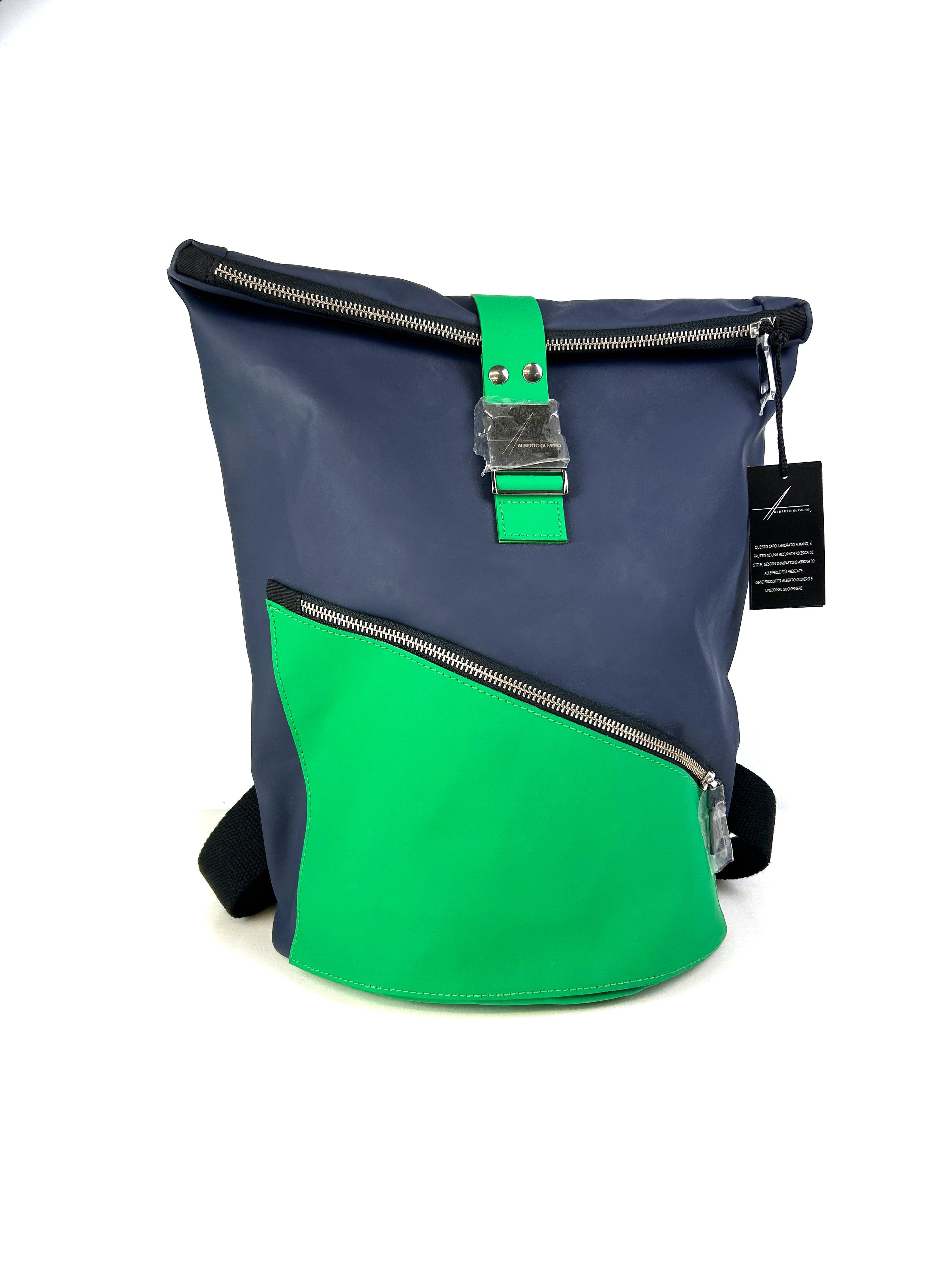 Navy Blue HADLEY Waterproof Backpack with green contrast  featuring external front pocket with diagonal zip.