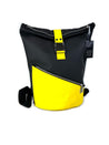 Black HADLEY Waterproof Backpack featuring bright yellow detailing on front of the bag and practical front pocket with diagonal zip 