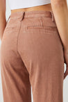 Unique terracotta brown chinos for women with two back pockets.