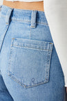 Back view of Leyl Crop Flare Fit Jeans, highlighting their stylish back pocket details.