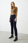 Side profile of sustainable dark blue Boyfriend Jeans for Women.